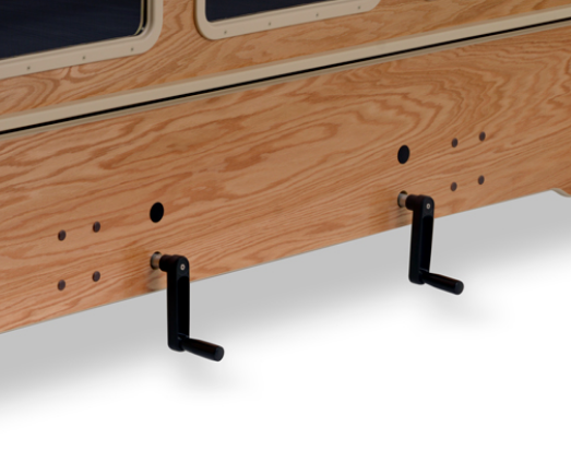 Closeup of the hand cranks used to raise and lower the bed.