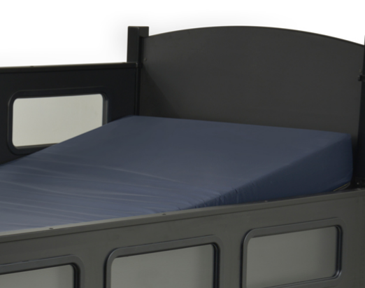 Closeup of a SleepSafe bed with an elevated mattress