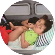 Zar lying in his SleepSafe bed.